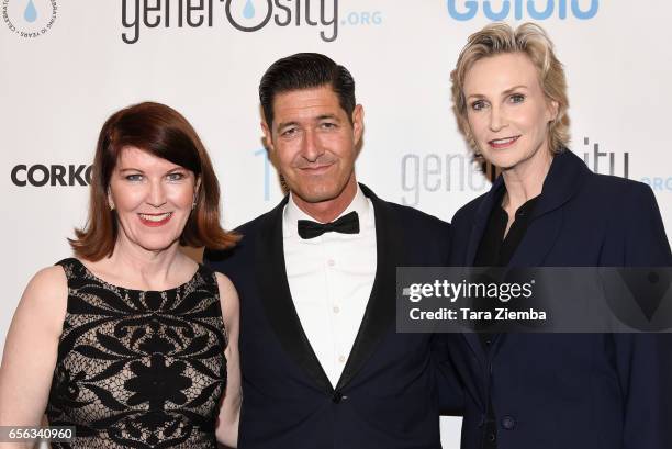 Kate Flannery, Tim Davis and Jane Lynch attend a Generosity.org fundraiser for World Water Day at Montage Hotel on March 21, 2017 in Beverly Hills,...