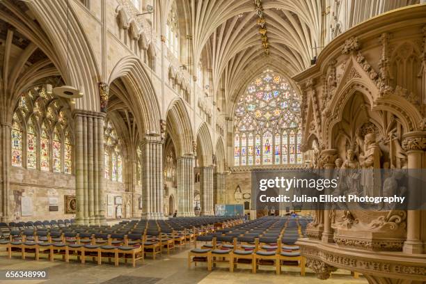 the nave of exeter cathedral, uk. - exeter cathedral stock pictures, royalty-free photos & images