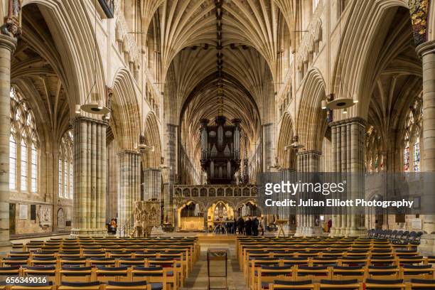 the nave of exeter cathedral, uk. - exeter devon stock pictures, royalty-free photos & images