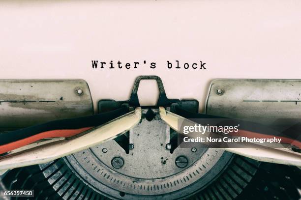 writer's block words typed on vintage typewriter - black authors stock pictures, royalty-free photos & images