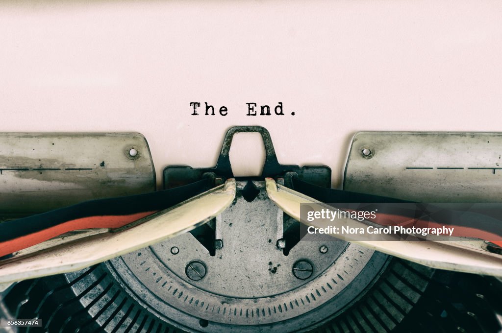 The End words type on Vintage Typewriter