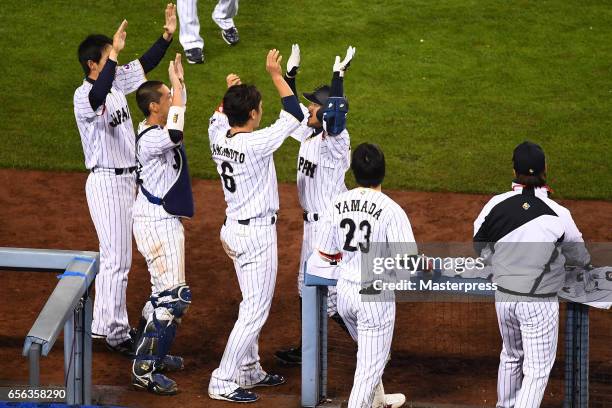 Ryosuke Kikuchi of Japan celebrates his game-tying home run with teammates in the six inning during the Game 2 of the Championship Round of the 2017...