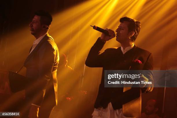 Bollywood singers Salim and Sulaiman Merchant performing during the roka ceremony of Kumar Dhruva and Taru Jain, on March 19 in New Delhi, India....