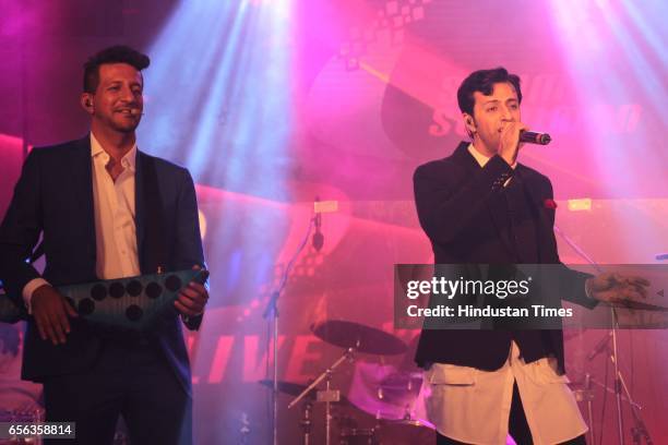 Bollywood singers Salim and Sulaiman Merchant performing during the roka ceremony of Kumar Dhruva and Taru Jain, on March 19 in New Delhi, India....