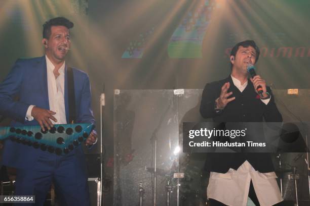 Bollywood singers Salim and Sulaiman Merchant performing during the roka ceremony of Kumar Dhruva and Taru Jain, on March 19 in New Delhi, India....