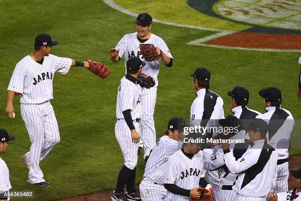 Tomoyuki Sugano of Japan reacts during the Game 2 of the Championship Round of the 2017 World Baseball Classic between United States and Japan at...