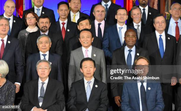 Participants in the G20 Finance Ministers and Central Bank Governors Meeting pose for the Family photo during the G20 finance ministers meeting on...