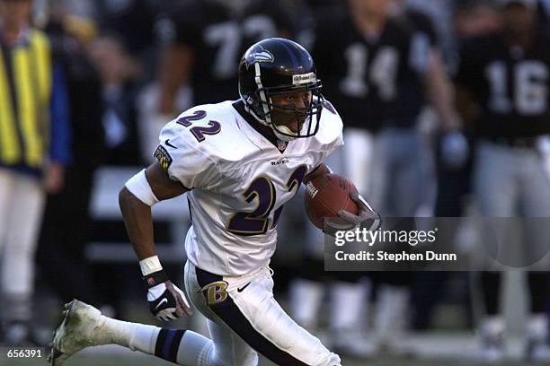 Duane Starks of the Baltimore Ravens grabs an interception against the Oakland Raiders during the AFC Championship game at Network Associates...