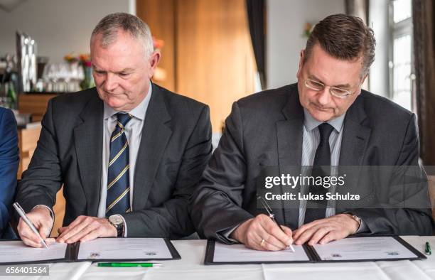 Chairman Greg Clarke and DFB president Reinhard Grindel sign a memorandum of understanding with the 'The FA' on March 22, 2017 in Herdecke, Germany.