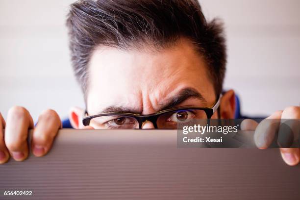 computer hacker stealing information with laptop - agent secret stock pictures, royalty-free photos & images