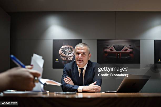 Ricardo Guadalupe, chief executive officer of Hublot SA, speaks during an interview at the company's booth during the 2017 Baselworld luxury watch...