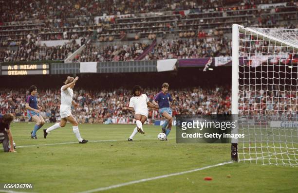 Ruud Gullit of AC Milan scores his first goal during the European Cup Final against Steaua Bucharest at the Nou Camp Stadium in Barcelona, Spain. AC...