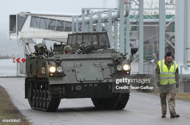 British Army aromured vehicle of the 5th Battalion The Rifles drives up from a ship dock after it and other heavy vehicles arrived by ship on March...