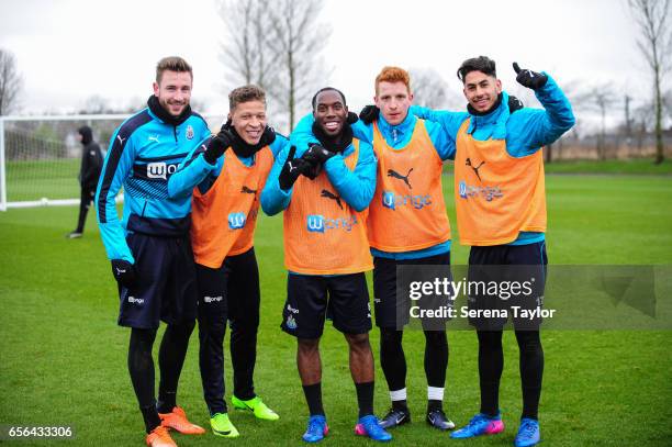 Newcastle players seen L-R Paul Dummett, Dwight Gayle, Vurnon Anita, Jack Colback and Ayoze Perez pose for a photo after winning a mini football...