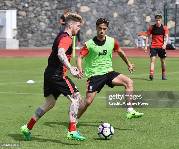 Alberto Moreno and Yan Dhanda of Liverpool during a training session at Tenerife Top Training on March 21, 2017 in Tenerife, Spain.