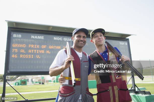 Valentino Rossi of Italy and Movistar Yamaha MotoGP poses with Nasser Al-Attiyah, London 2012 Men's Skeet Olympic Bronze Medalist in and former Dakar...