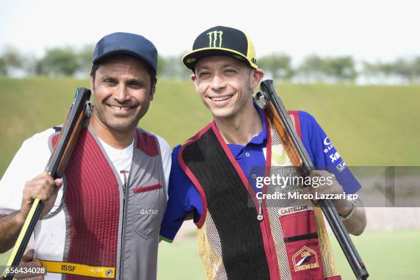 Valentino Rossi of Italy and Movistar Yamaha MotoGP poses with Nasser Al-Attiyah, London 2012 Men's Skeet Olympic Bronze Medalist in and former Dakar...