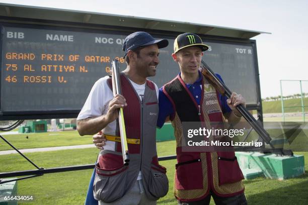 Valentino Rossi of Italy and Movistar Yamaha MotoGP poses with Nasser Al-Attiyah, London 2012 Men's Skeet Olympic Bronze Medalist in and former Dakar...