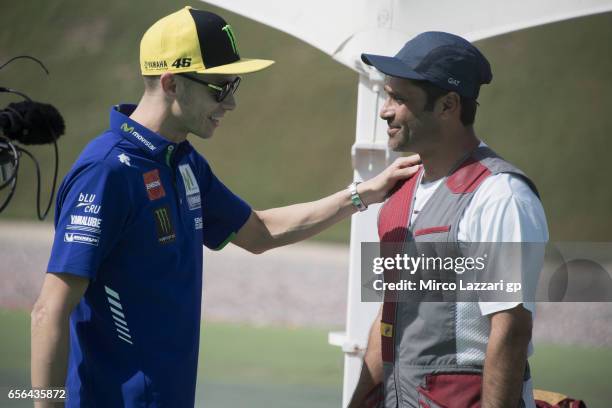 Valentino Rossi of Italy and Movistar Yamaha MotoGP greets with Nasser Al-Attiyah, London 2012 Men's Skeet Olympic Bronze Medalist in and former...