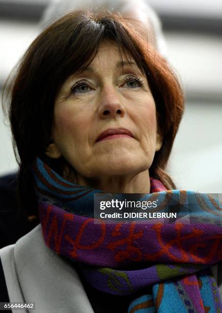 Belgian Socialist Party member Laurette Onkelinx stands during a minute of silence at 09:11 am in the Maelbeek - Maalbeek subway station on the first...