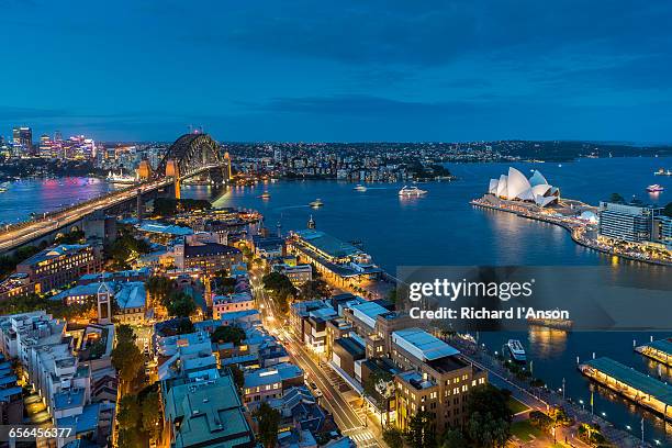 the rocks, harbour bridge & opera house at dusk - sydney opera house stock pictures, royalty-free photos & images