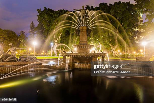 archibald fountain in hyde park at dusk - archibald fountain stock pictures, royalty-free photos & images