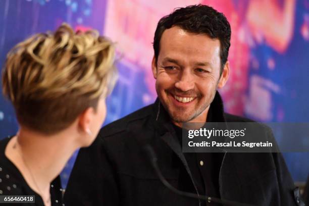 Scarlett Johansson and Rupert Sanders attend the official press conference for the Paris Premiere of the Paramount Pictures release "Ghost In The...