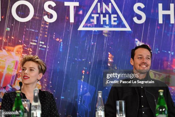 Scarlett Johansson and Rupert Sanders attend the official press conference for the Paris Premiere of the Paramount Pictures release "Ghost In The...