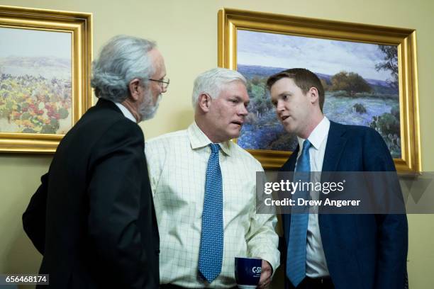 House Rules Committee Chairman Rep. Pete Sessions speaks with an aide during a House Rules Committee meeting to set the rules for debate and...