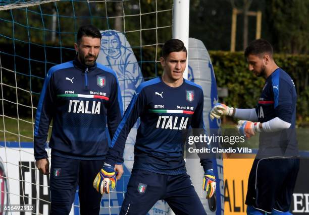 Gianluigi Buffon, Alex Meret and Gianluigi Donnarumma of Italy look on during the training session at the club's training ground at Coverciano on...