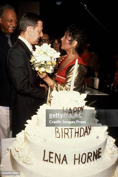 Tony Randall helps Lena Horne celebrate her birthday circa 1981 in New York City.
