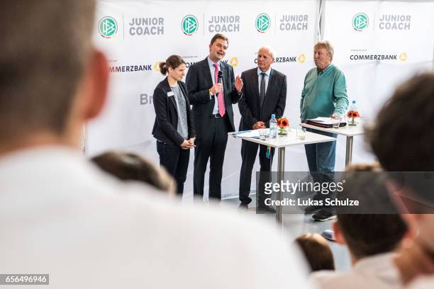 Soccer player Annike Krahn , Andre Carls of Commerzbank, moderator Wolfgang Staab and former soccer coach Horst Hrubesch talk to the DFB Junior...