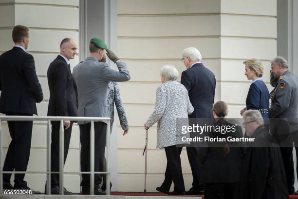 German new president Frank-Walter Steinmeier goes into the Bellevue Presidential Palace with his mother Ursula Steinmeier next to him after his...