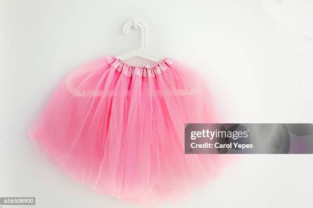 hanging pink tutu - tutu stock pictures, royalty-free photos & images