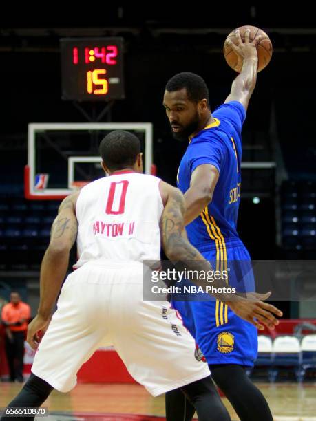 James Southerland of the Santa Cruz Warriors holds the ball away from Gary Payton II of the Rio Grande Valley Vipers at the State Farm Arena March...