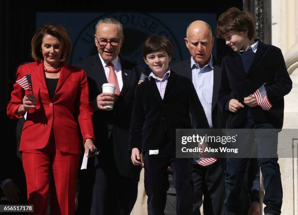 House Minority Leader Rep. Nancy Pelosi , Senate Minority Leader Sen. Charles Schumer , California Governor Jerry Brown , and Pelosi's grandsons Paul...