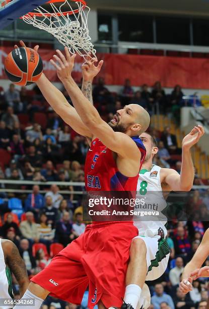 James Augustine of the CSKA Moscow shoots the ball against Adrien Moerman of the Darussafaka Dogus Istanbul during the 2016/2017 Turkish Airlines...