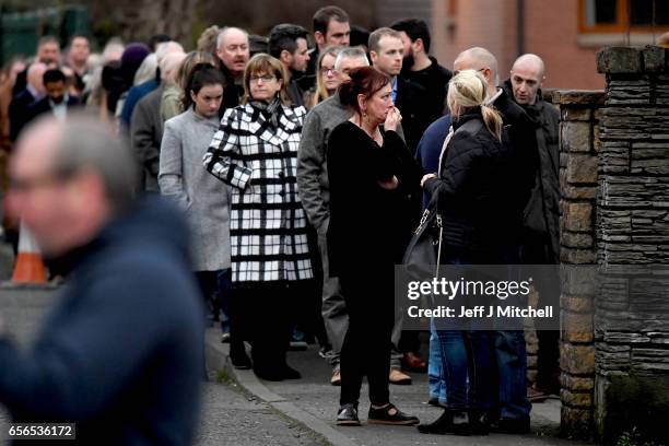Mourners gather to pay ther respects at the home of Martin McGuinness on March 22, 2017 in Londonderry, Northern Ireland. Northern Ireland's Former...