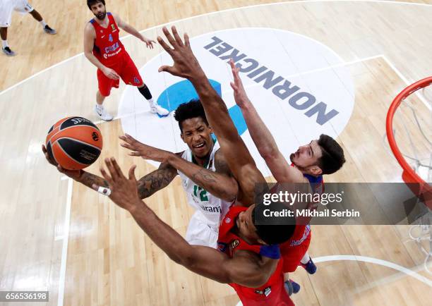 Will Clyburn, #12 of Darussafaka Dogus Istanbul competes with Kyle Hines, #42 of CSKA Moscow in action during the 2016/2017 Turkish Airlines...