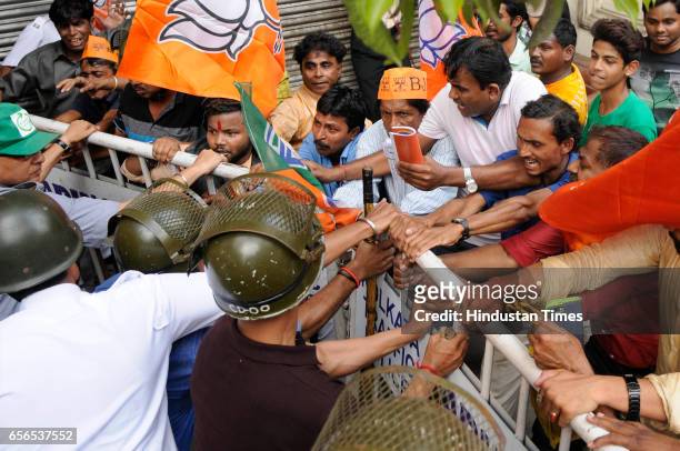 Leaders and supporters clash with the police during a protest rally demanding the arrest of Trinamool Congress leaders allegedly involved in Narada...