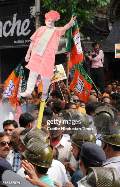 Leaders and supporters during a protest rally demanding the arrest of Trinamool Congress leaders allegedly involved in Narada Sting case at Esplanade...