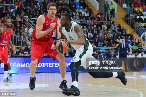 James Anderson of the Darussafaka Dogus Istanbul drives to the basket against Victor Khryapa of the CSKA Moscow during the 2016/2017 Turkish Airlines...