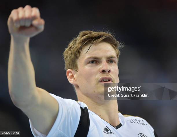 Rune Dahmke of Kiel celebrates during the first leg round of 16 EHF Champions League match between THW Kiel and Rhein Neckar Loewen at Sparkassen...