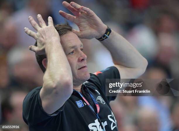 Alfred Gislason, head coach of Kiel reacts during the first leg round of 16 EHF Champions League match between THW Kiel and Rhein Neckar Loewen at...