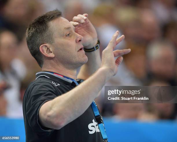 Alfred Gislason, head coach of Kiel reacts during the first leg round of 16 EHF Champions League match between THW Kiel and Rhein Neckar Loewen at...