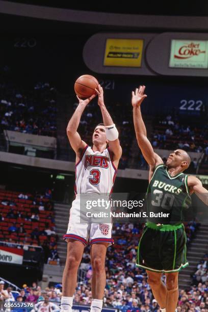 Drazen Petrovic of the New Jersey Nets shoots against the Milwaukee Bucks during a game played circa 1993 at the Brendan Byrne Arena in East...
