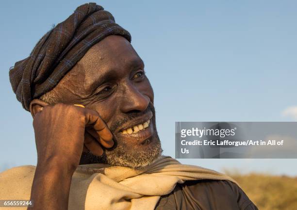Borana tribe man smiles during the Gada system ceremony, Oromia, Yabelo, Ethiopia on March 6, 2017 in Yabelo, Ethiopia.