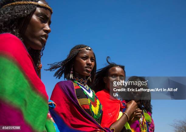 Borana tribe virgin girls stand together during the Gada system ceremony, Oromia, Yabelo, Ethiopia on March 7, 2017 in Yabelo, Ethiopia.