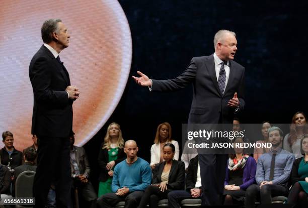 Starbucks President and Chief Operating Officer Kevin Johnson and Chairman and CEO Howard Shultz hold a parter open forum on stage at the Annual...