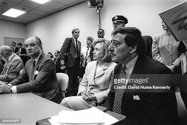 First Lady Hillary Clinton and White House Chief of Staff Leon Panetta listen during a briefing in New York on July 26, 1996 on the crash of TWA...